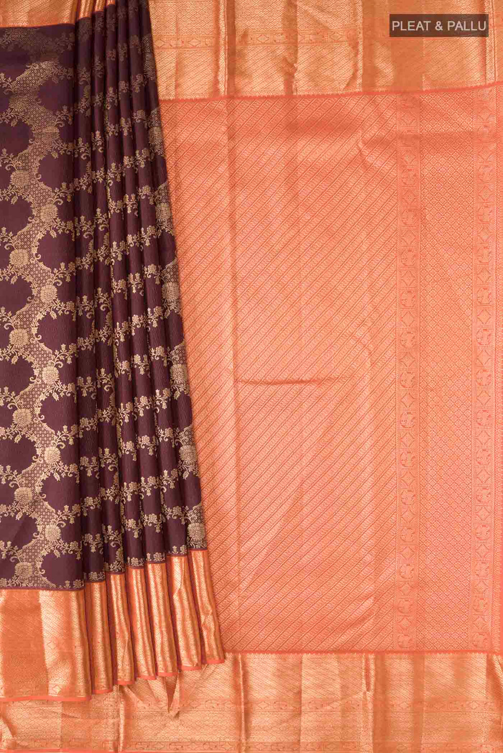 Pleats and pallu of Brown Kanchipuram Silk Saree with Zari Butta on the body and Zari Border