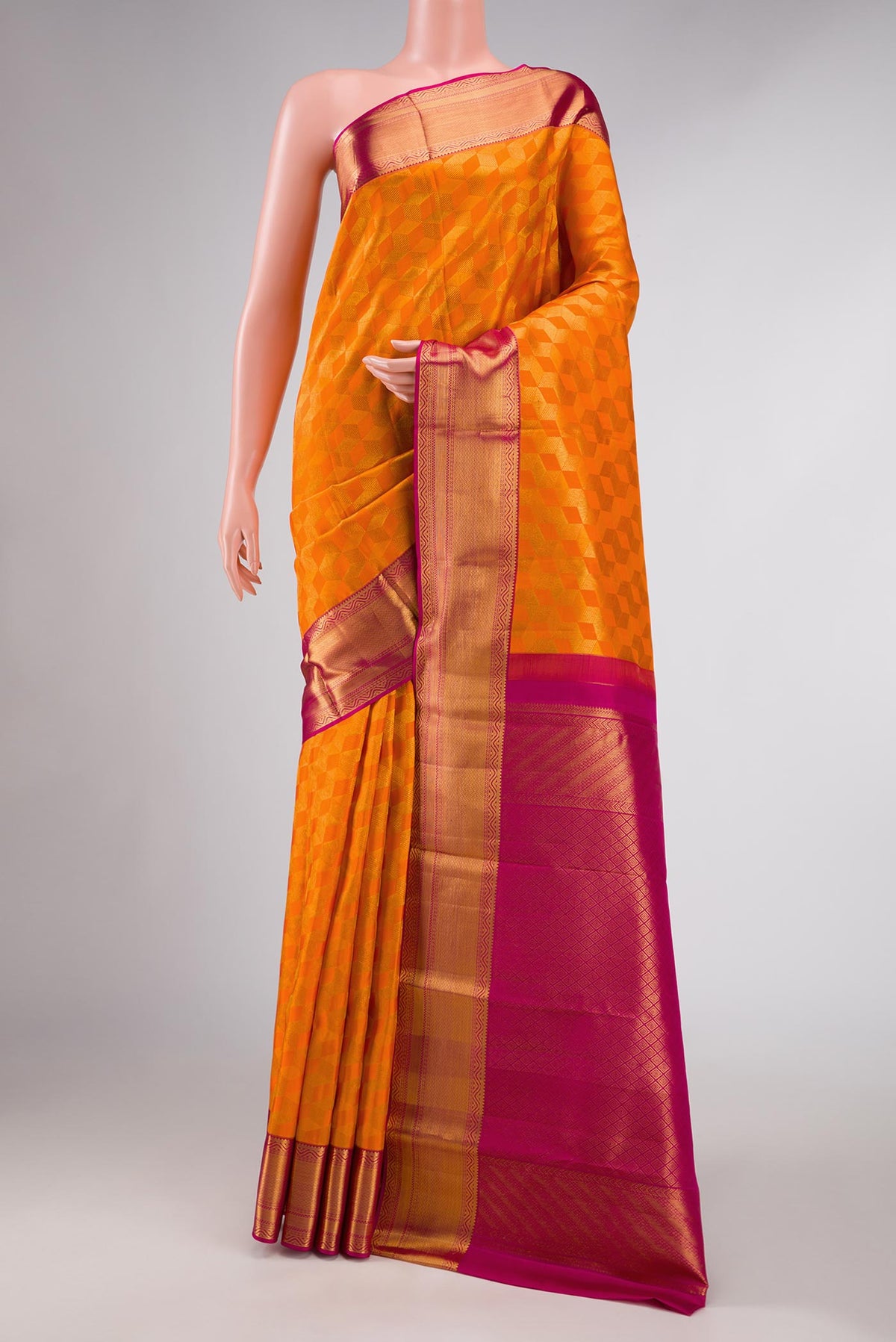 Orange Dual Tone Kanchipuram Silk Saree with Zari Brocade on the body and Zari Border displayed on a mannequin