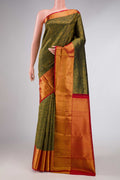 Green Dual Tone Kanchipuram Silk Saree with Zari Brocade on the body and Zari Border displayed on a mannequin