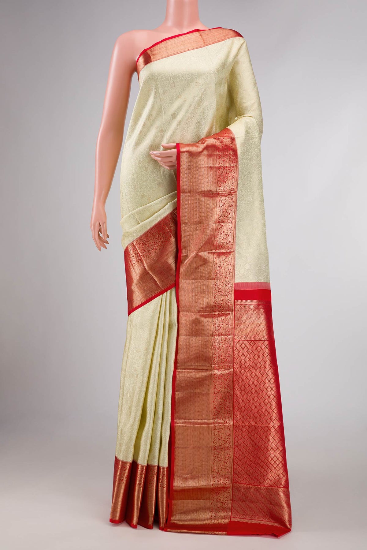 Off White Dual Tone Kanchipuram Silk Saree with Zari Brocade on the body and Zari Border displayed on a mannequin