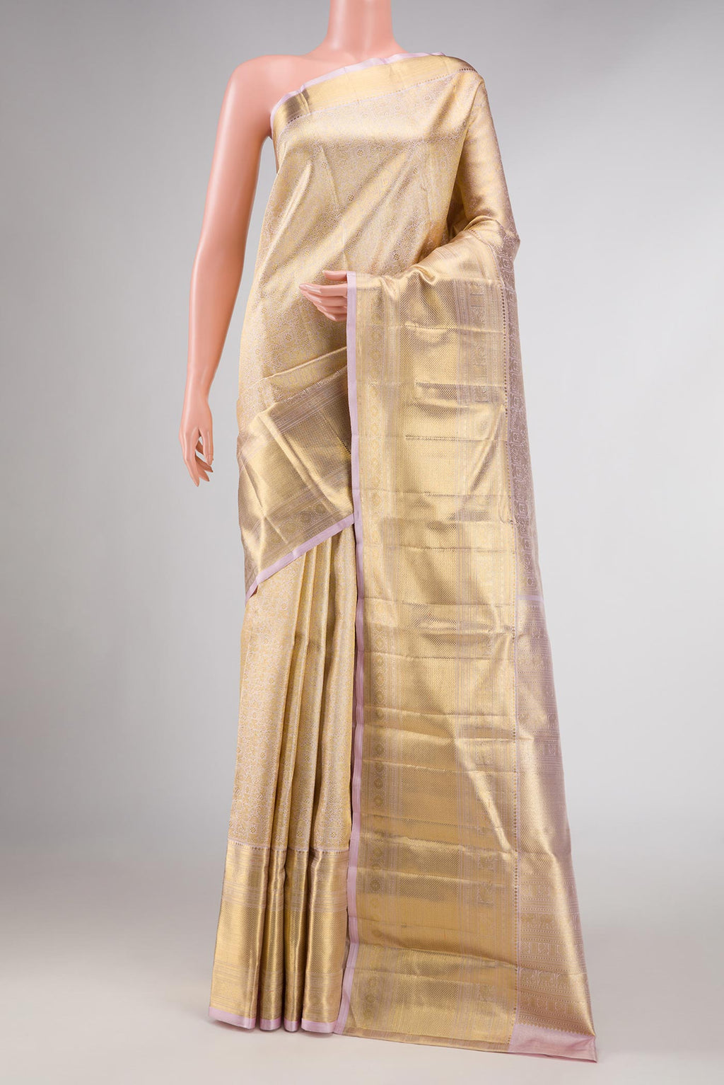 Pure Silk Pure Zari Lavender Dual Tone Kanchipuram Saree with Zari Brocade on the body and Zari Border displayed on a mannequin
