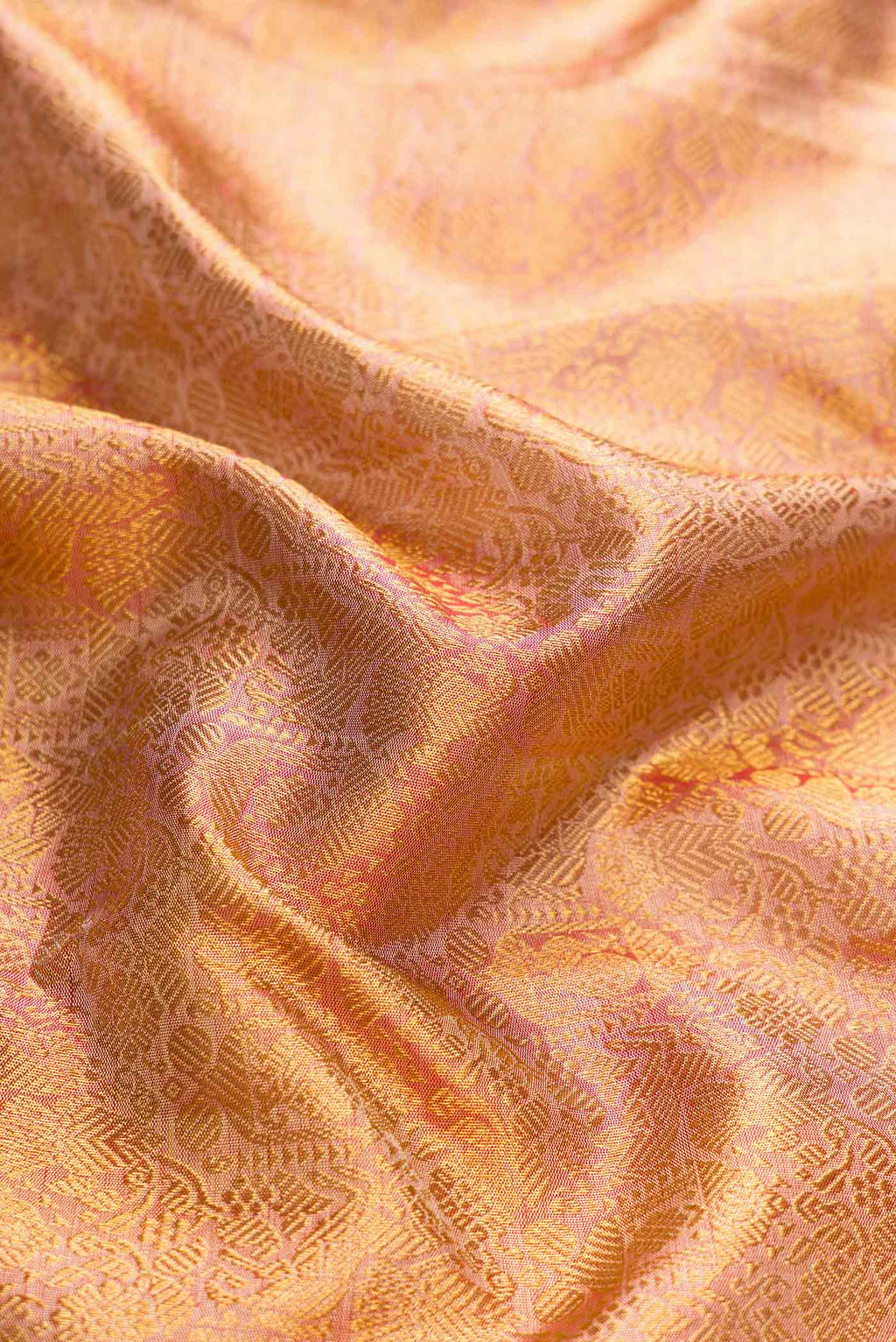 Close up of Pure Silk Pure Zari Pink Dual Tone Kanchipuram Saree with Zari Brocade on the body and Zari Border displaying folds