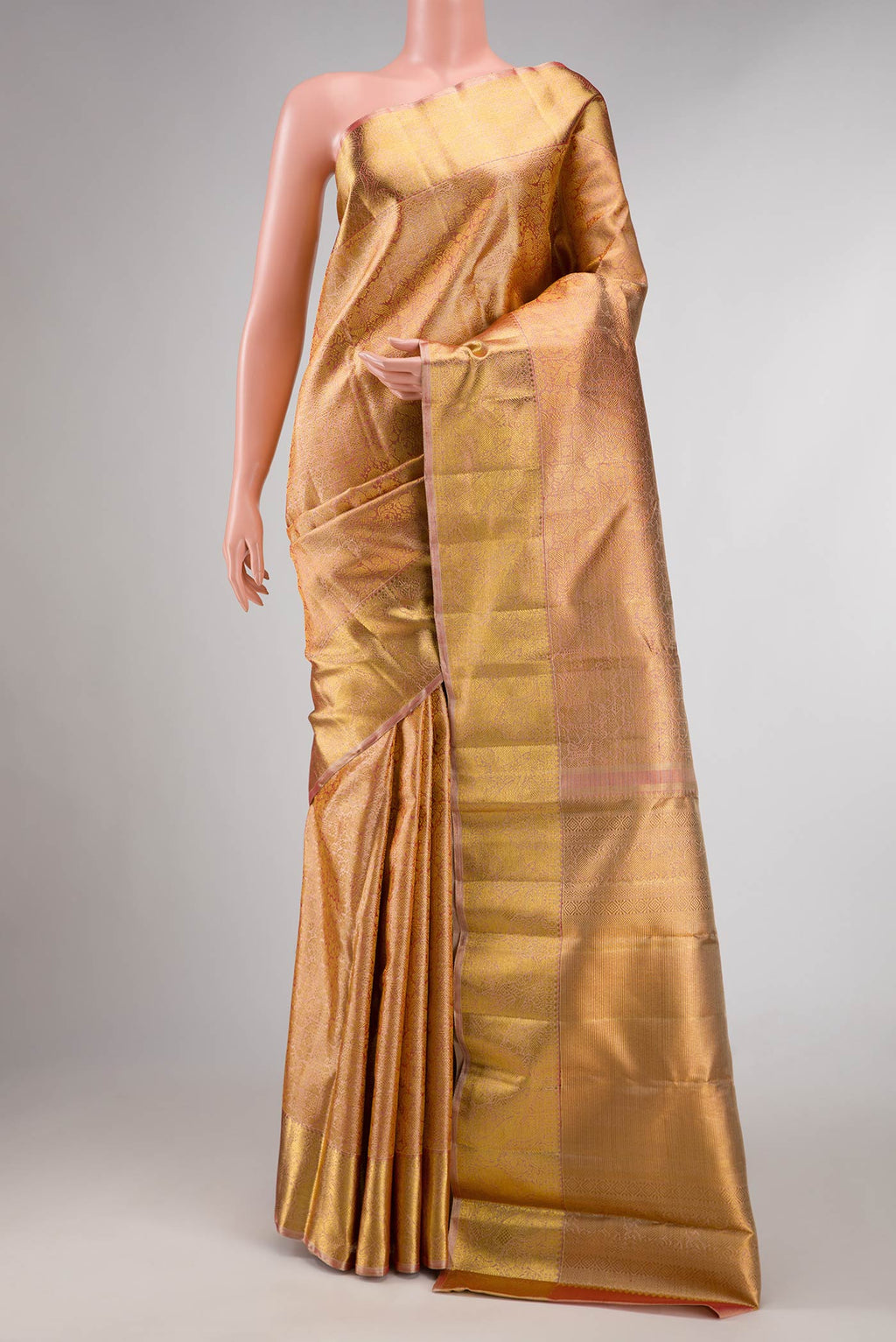 Pure Silk Pure Zari Pink Dual Tone Kanchipuram Saree with Zari Brocade on the body and Zari Border displayed on a mannequin