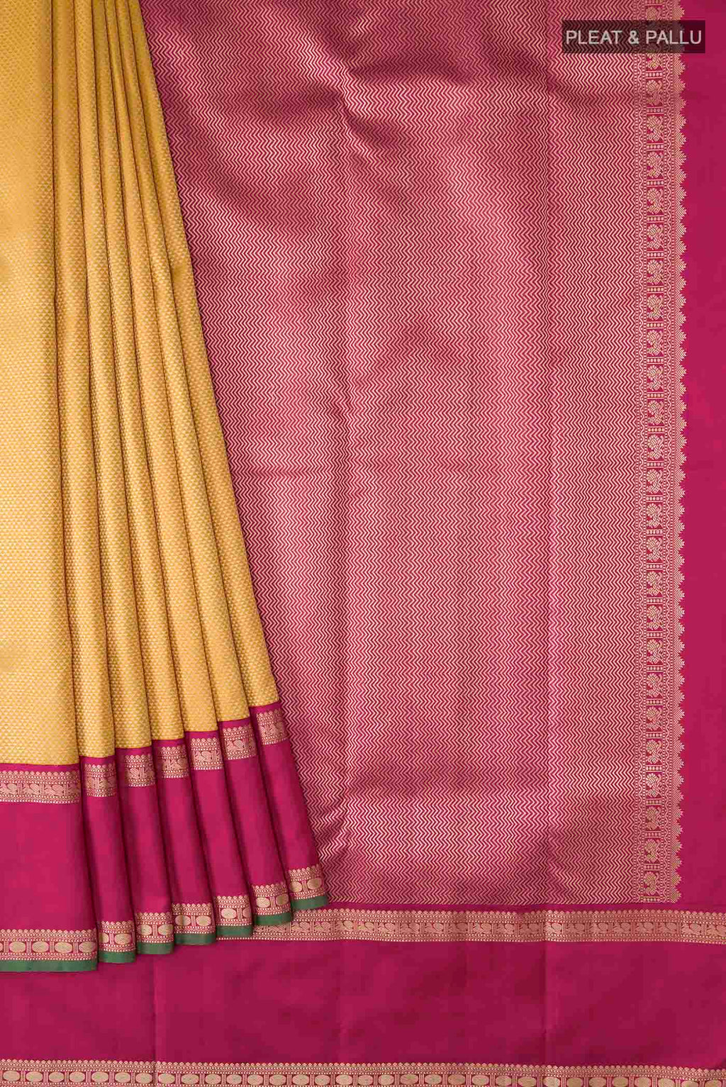 Pleats and pallu of Yellow Kanchipuram Silk Saree with Jacquard design on the body and Thread Border