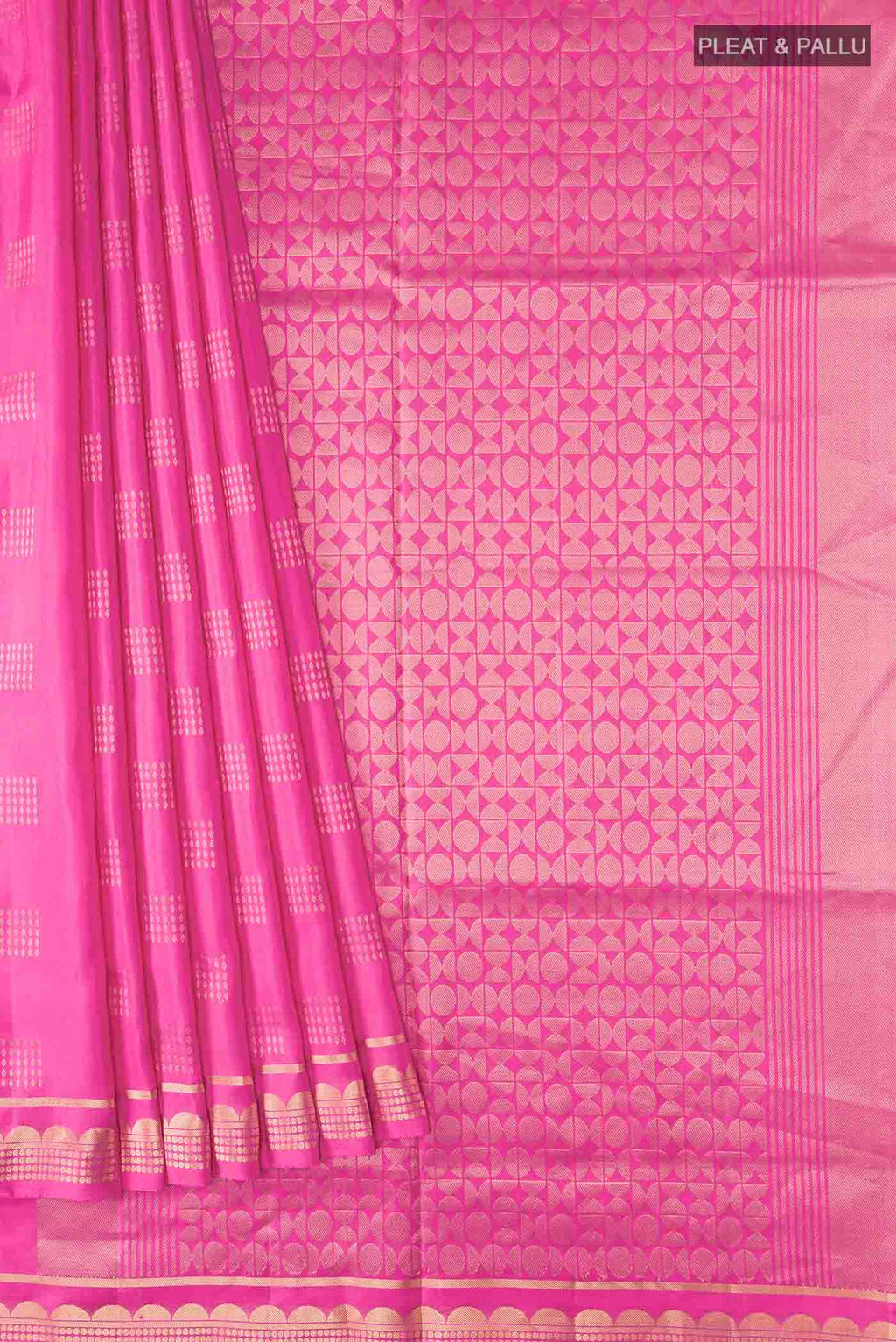 Pleats and pallu of Pink Soft Silk Saree with Zari Butta on the body and Zari Border