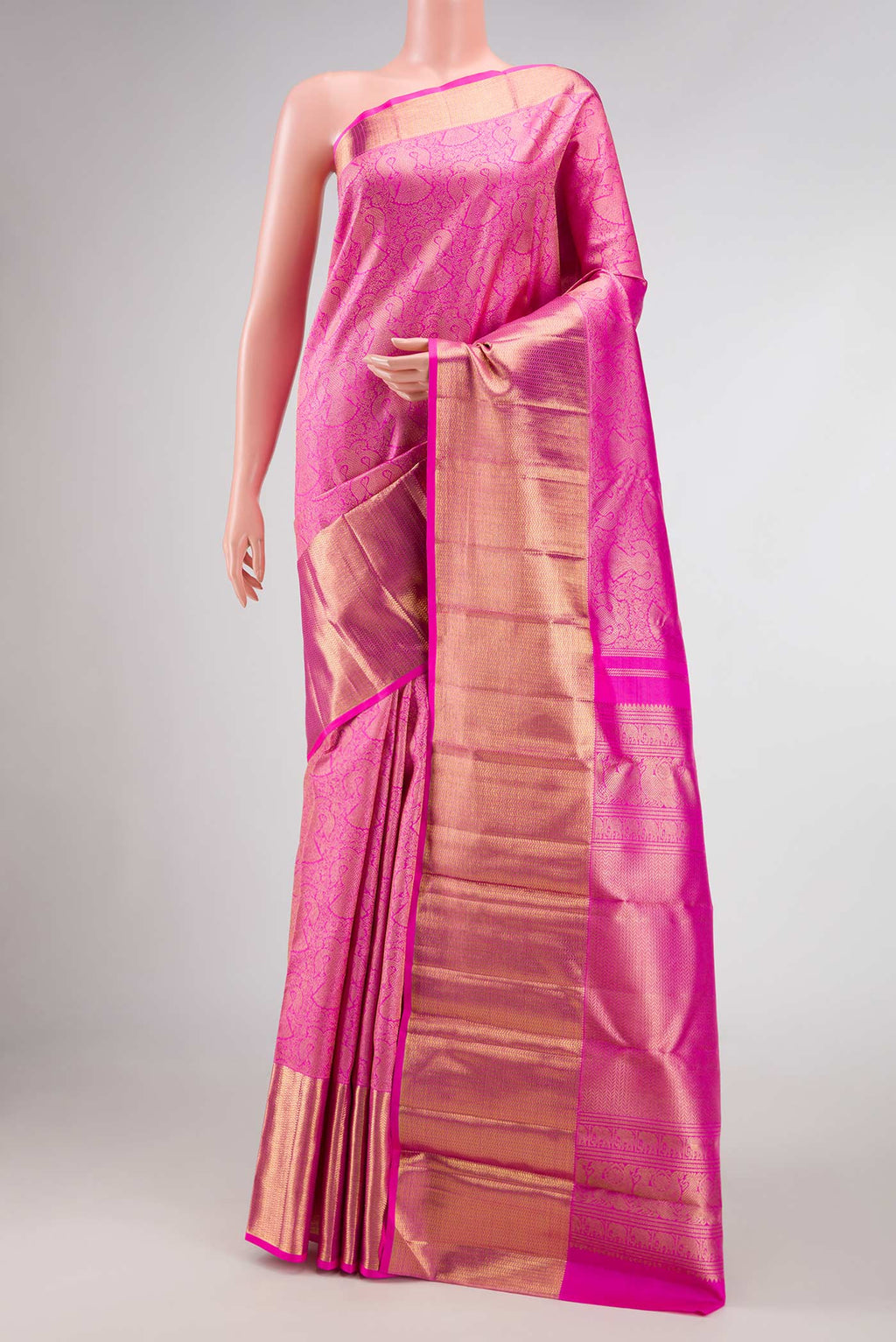 Pure Silk Pure Zari Pink Dual Tone Kanjivaram Saree with Zari Brocade on the body and Zari Border.  displayed on a mannequin