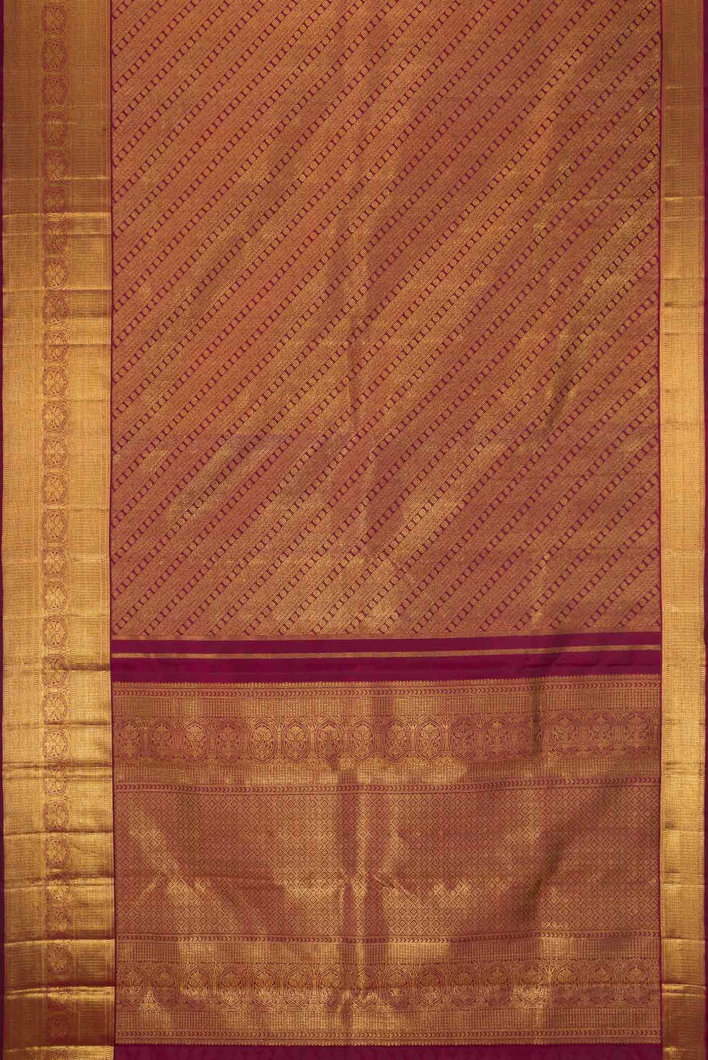 Flat view of Pure Silk Pure Zari Maroon Dual Tone Kanjivaram Saree with Zari Brocade on the body and Zari Border. 