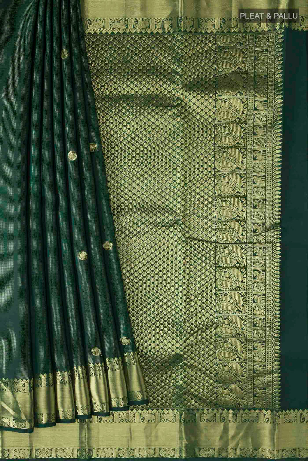 Pleats and pallu of Green Kanchipuram Silk Saree with Zari Butta on the body and Zari Border
