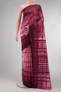 Maroon Dual Tone Tussar Silk Saree with Printed design on the body and Plain Border.  displayed on a mannequin