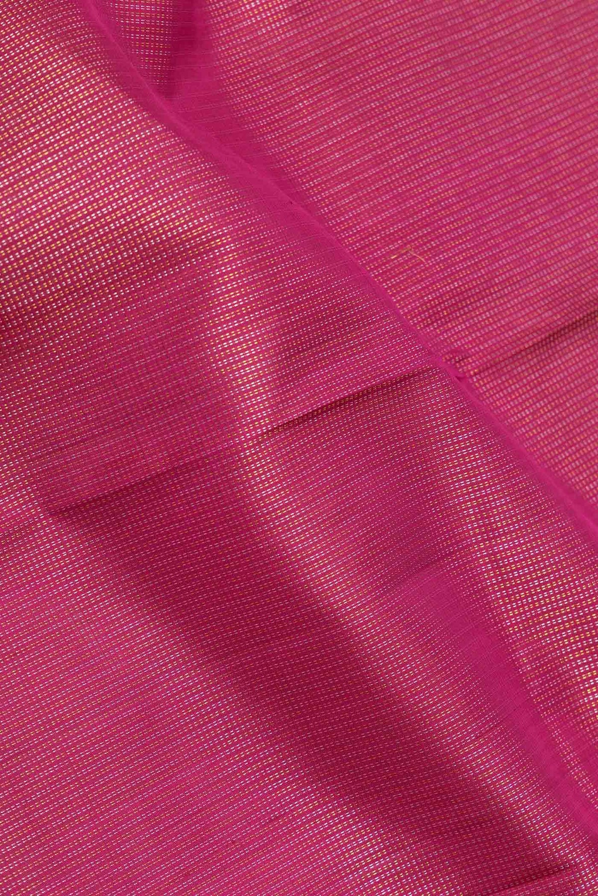 Close up of Pink Dual Tone Kanchipuram Silk Saree with Zari Brocade on the body and Zari Border displaying folds