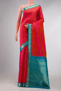 Dark Pink Dual Tone Kanchipuram Silk Saree with Zari Butta on the body and Zari Border displayed on a mannequin