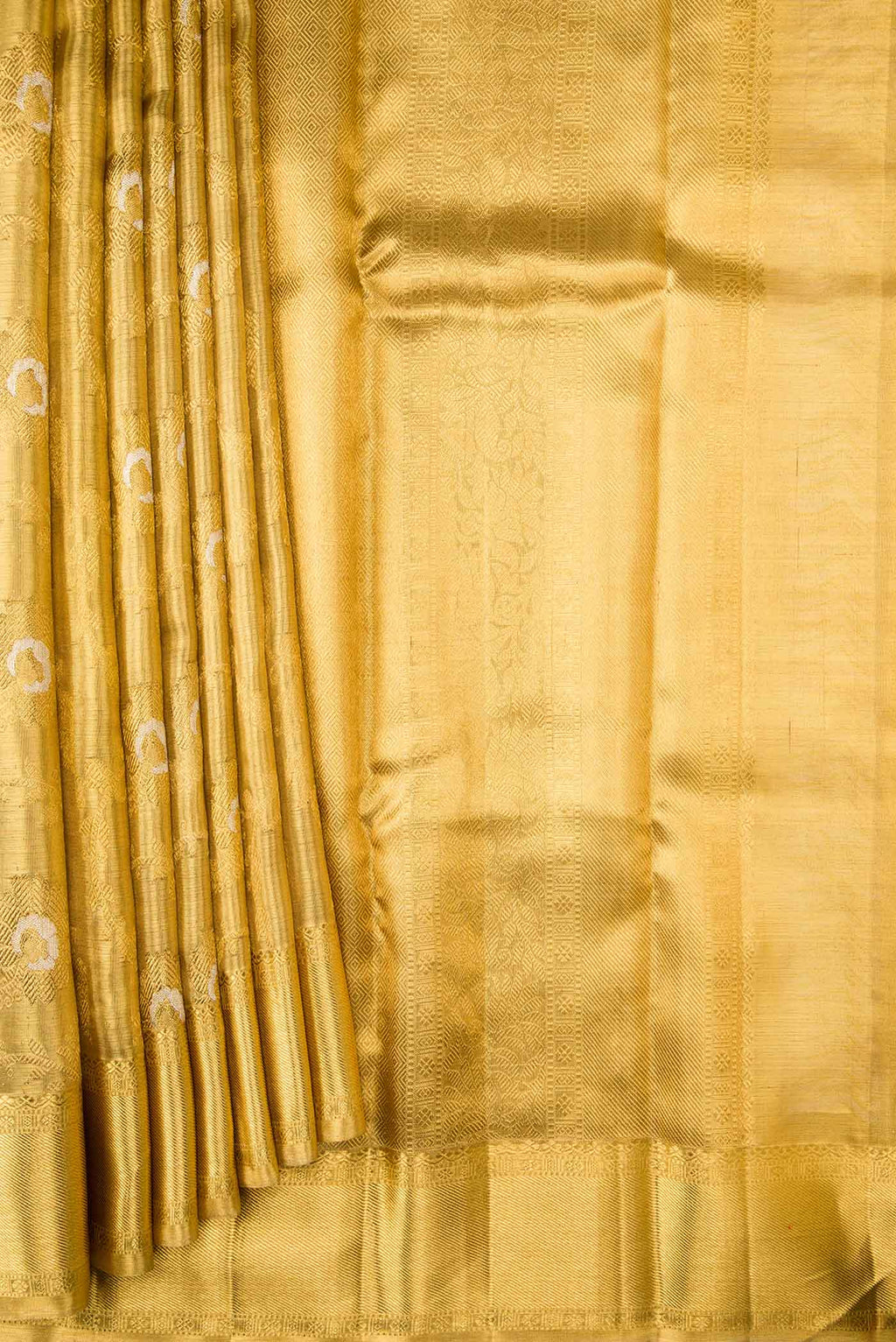 Pleats and pallu of Pure Silk Pure Zari Gold Dual Tone Kanchipuram Tissue Saree with Zari Brocade on the body and Zari Border