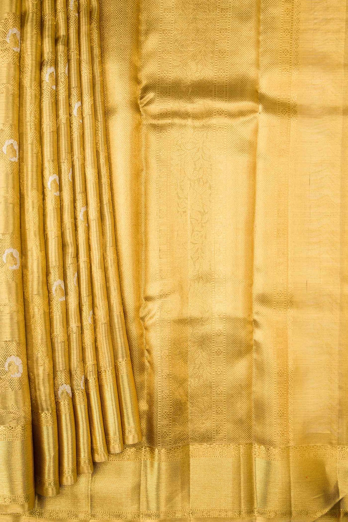 Pleats and pallu of Pure Silk Pure Zari Gold Dual Tone Kanchipuram Tissue Saree with Zari Brocade on the body and Zari Border