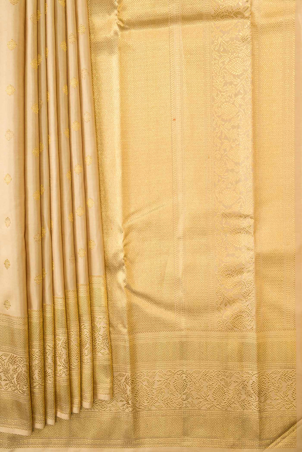 Pleats and pallu of Pure Silk Pure Zari Sandal Dual Tone Kanchipuram Saree with Zari Butta on the body and Zari Border