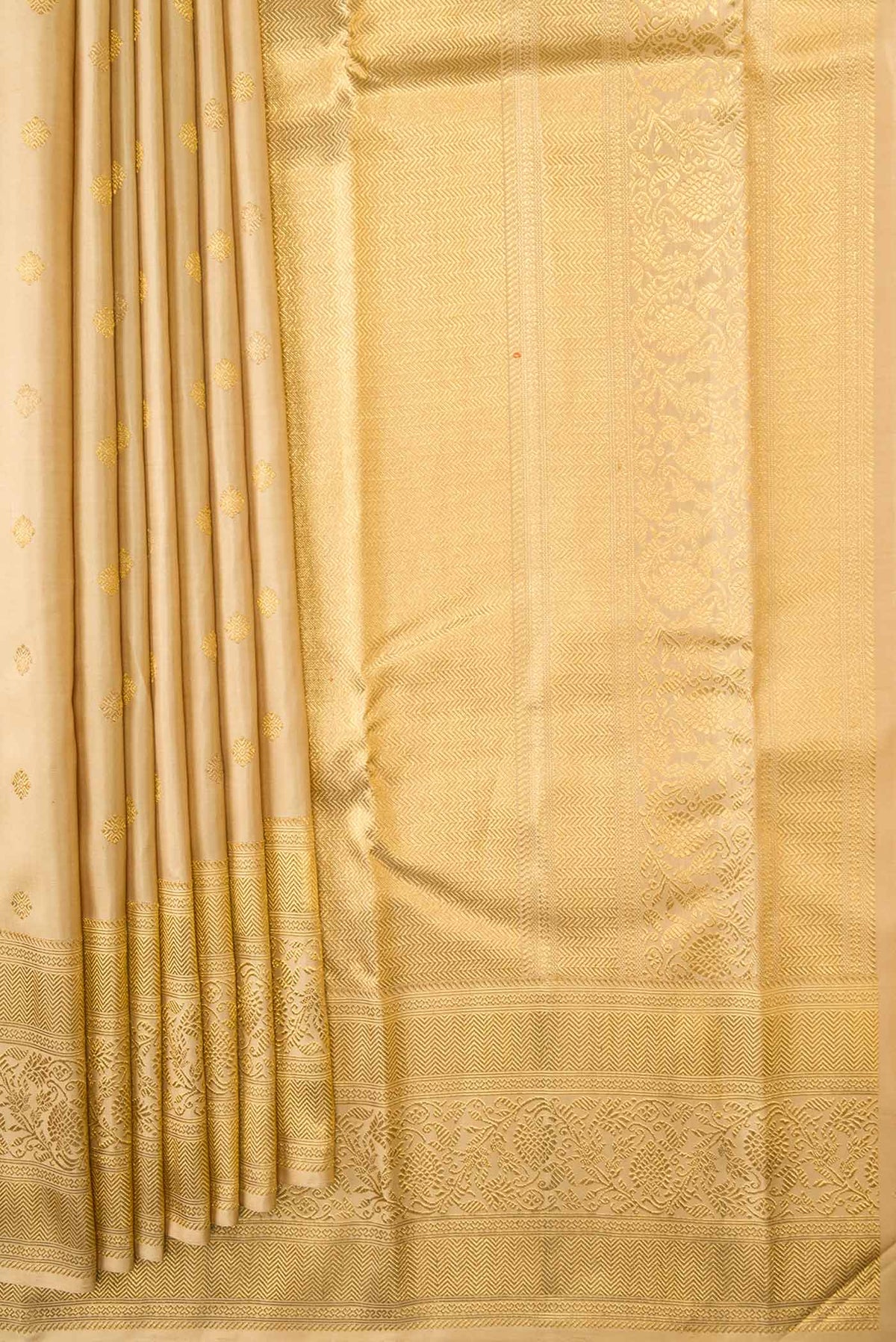Pleats and pallu of Pure Silk Pure Zari Sandal Dual Tone Kanchipuram Saree with Zari Butta on the body and Zari Border