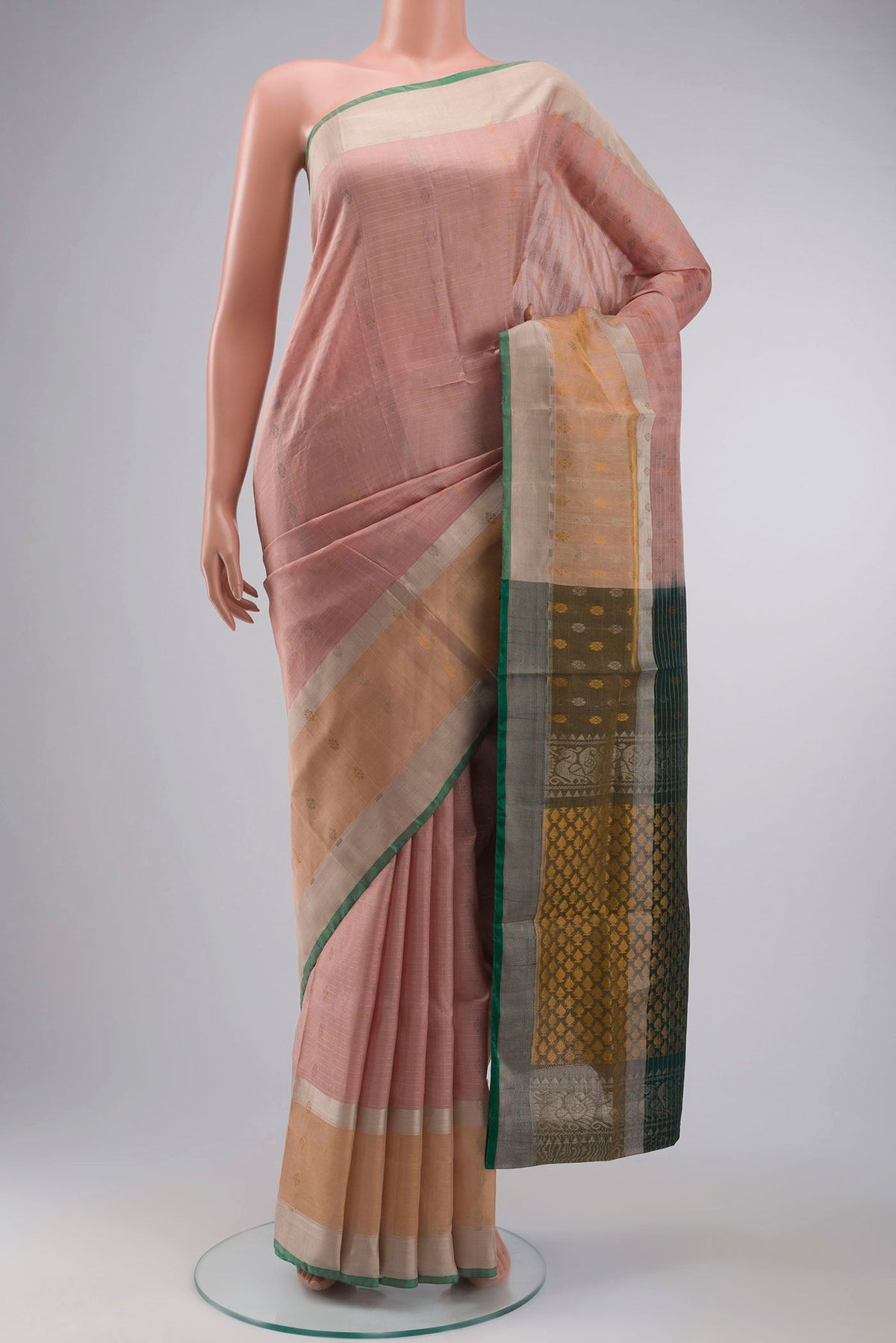 Pink Uppada Silk Saree with Zari Butta on the body and Zari Border displayed on a mannequin