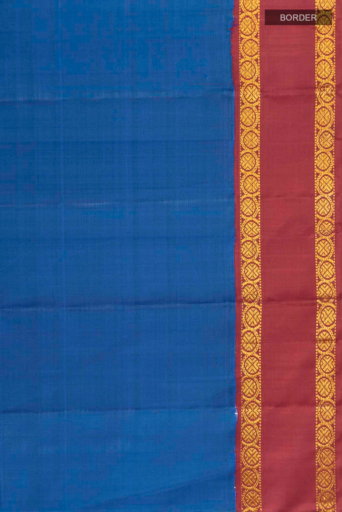 Border image of Blue Kanchipuram Silk Saree with Zari Butta on the body and Zari Border