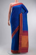 Blue Kanchipuram Silk Saree with Zari Butta on the body and Zari Border displayed on a mannequin