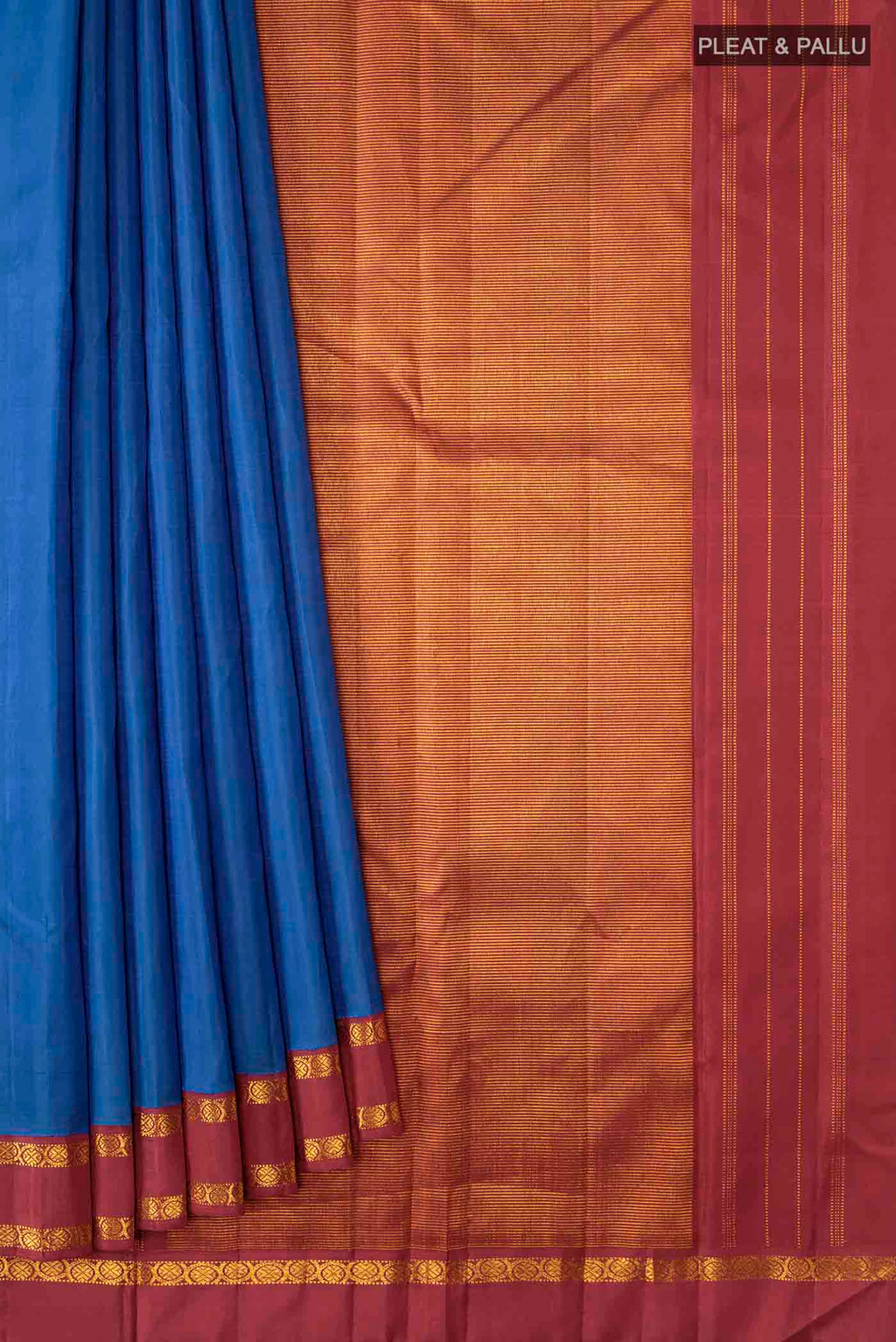 Pleats and pallu of Blue Kanchipuram Silk Saree with Zari Butta on the body and Zari Border