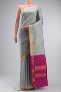Grey Kanchipuram Silk Saree with Plain Body and Zari Border displayed on a mannequin