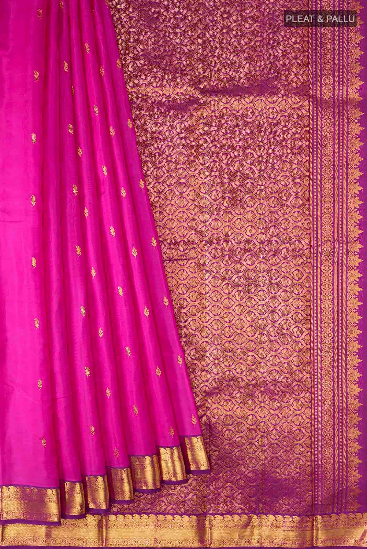 Pleats and pallu of Pink Kanchipuram Silk Saree with Zari Butta on the body and Zari Border