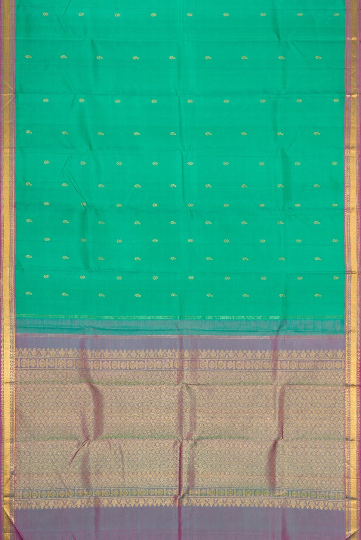Flat view of Green Dual Tone Kanchipuram Silk Saree with Zari Butta on the body and Zari Border. 