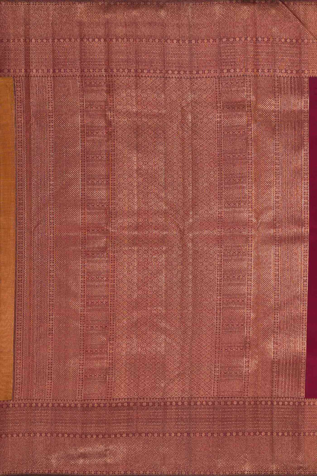 Close up image of the pallu of Mustard Dual Tone Kanchipuram Silk Saree with Zari Brocade on the body and Zari Border