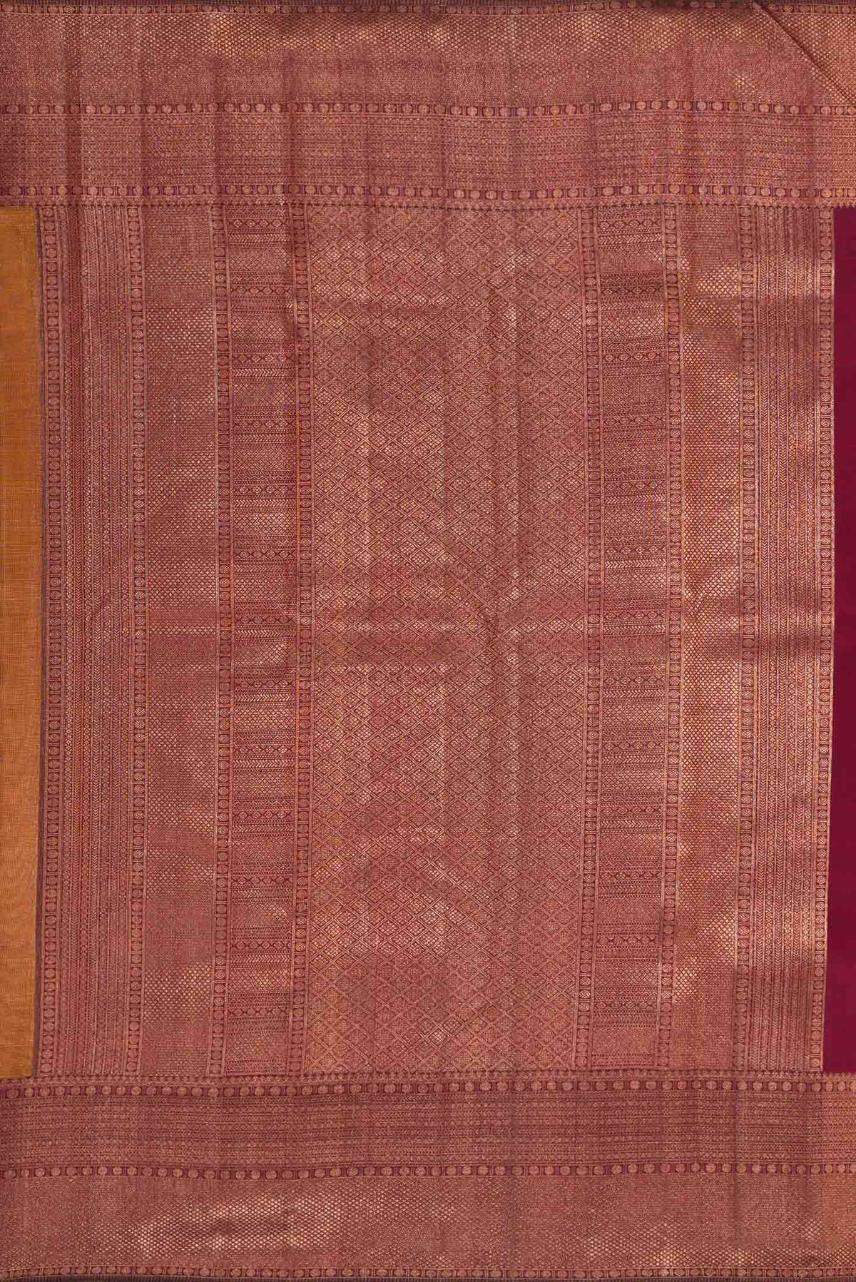 Close up image of the pallu of Mustard Dual Tone Kanchipuram Silk Saree with Zari Brocade on the body and Zari Border