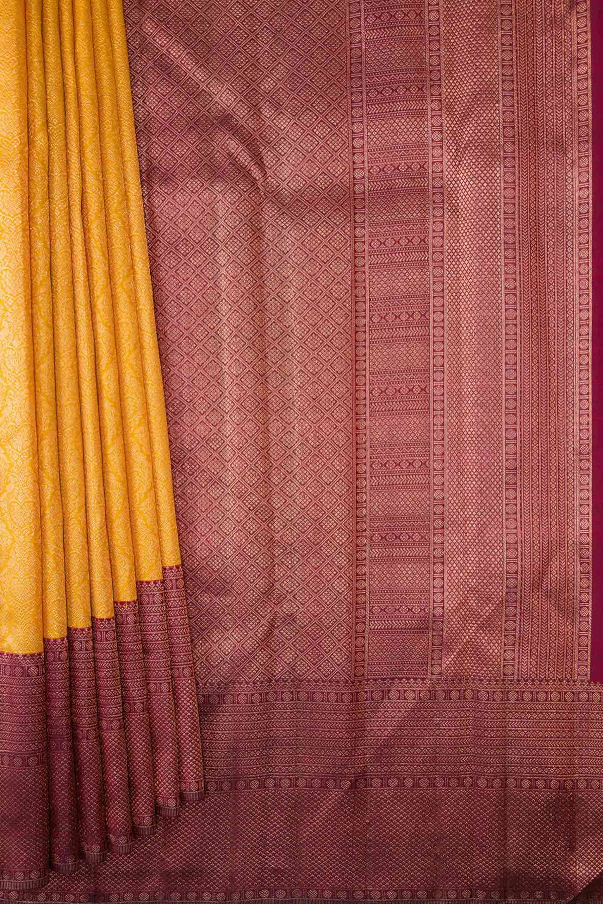 Pleats and pallu of Mustard Dual Tone Kanchipuram Silk Saree with Zari Brocade on the body and Zari Border
