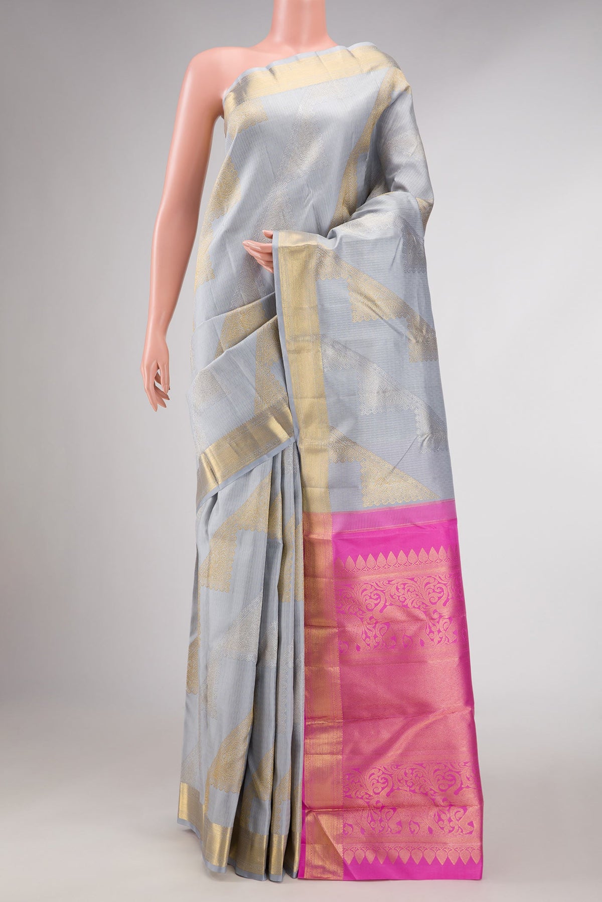 Grey Dual Tone Kanchipuram Silk Saree with Jacquard With Zari Butta on the body and Zari Border displayed on a mannequin