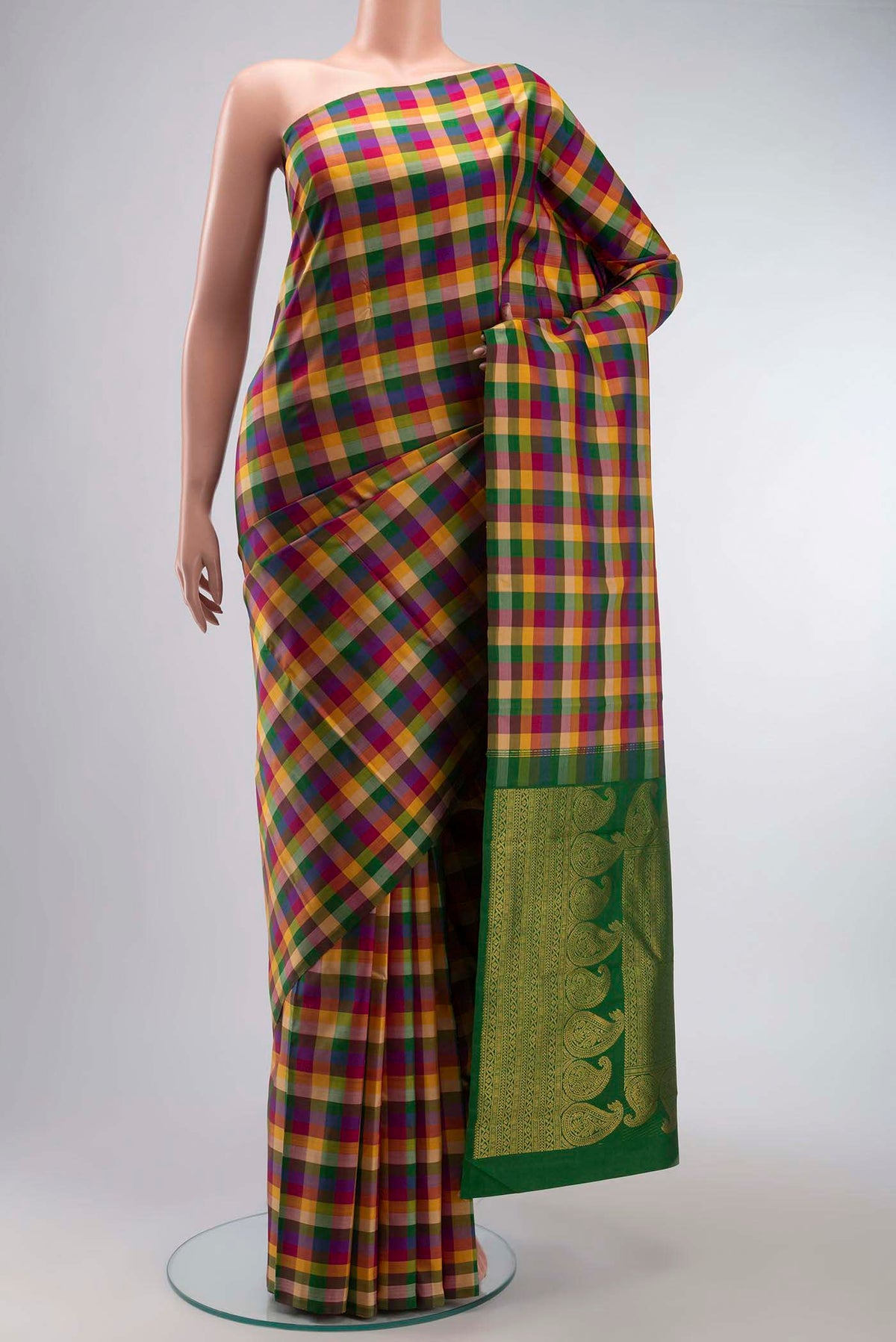 Multi Color Kanchipuram Silk Saree with Checked design on the body and Without Border displayed on a mannequin