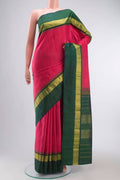 Pink Kanchipuram Silk Saree with Checked design on the body and Zari Border displayed on a mannequin