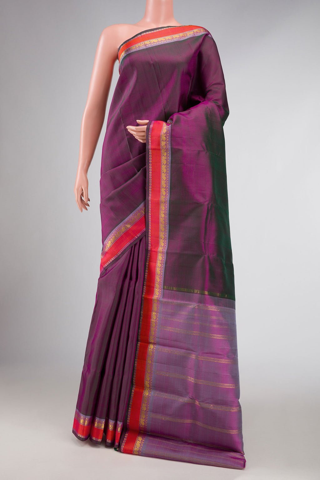 Purple Dual Tone Kanchipuram Silk Saree with Plain Body and Zari Border displayed on a mannequin