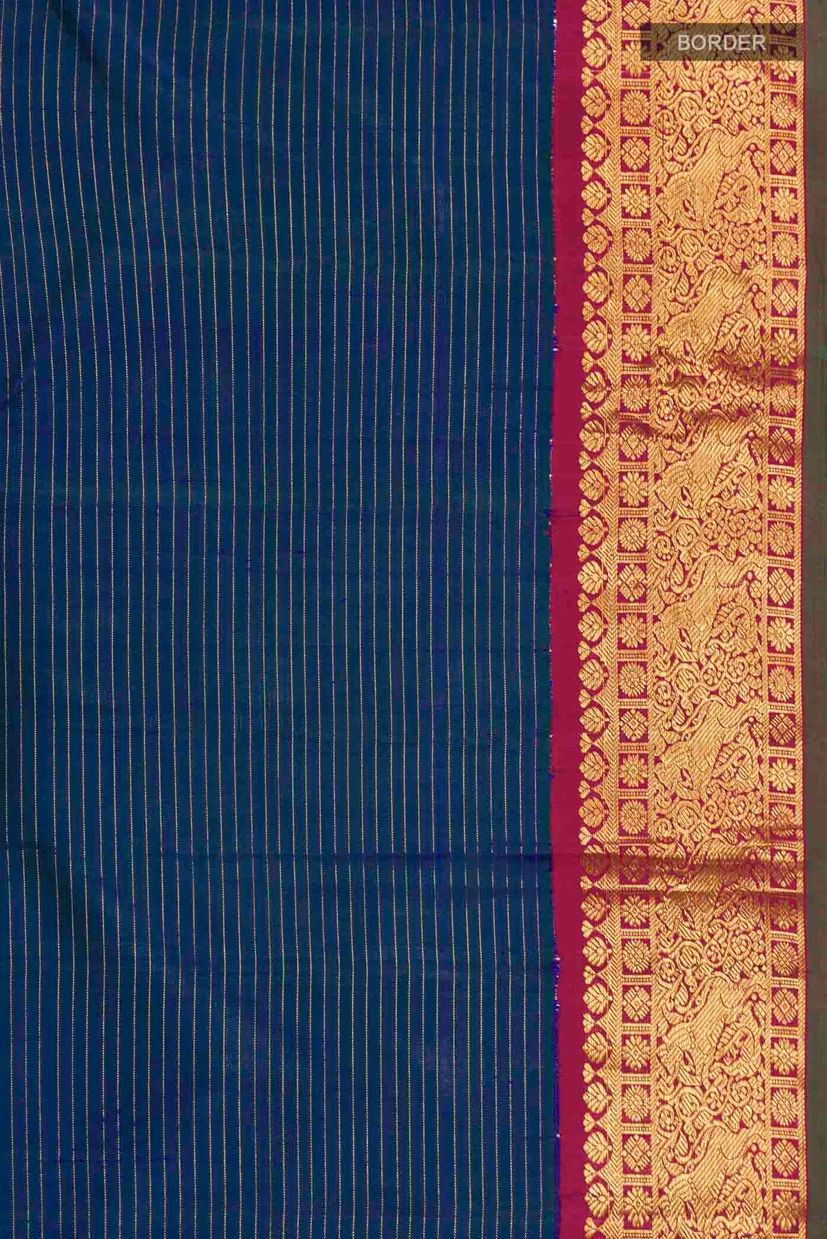 Border image of Blue Kanchipuram Silk Saree with Stripes on the body and Zari Border