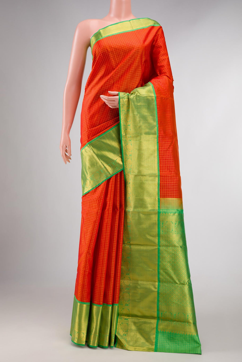Pure Silk Pure Zari Orange Dual Tone Kanchipuram Saree with Stripes on the body and Zari Border displayed on a mannequin