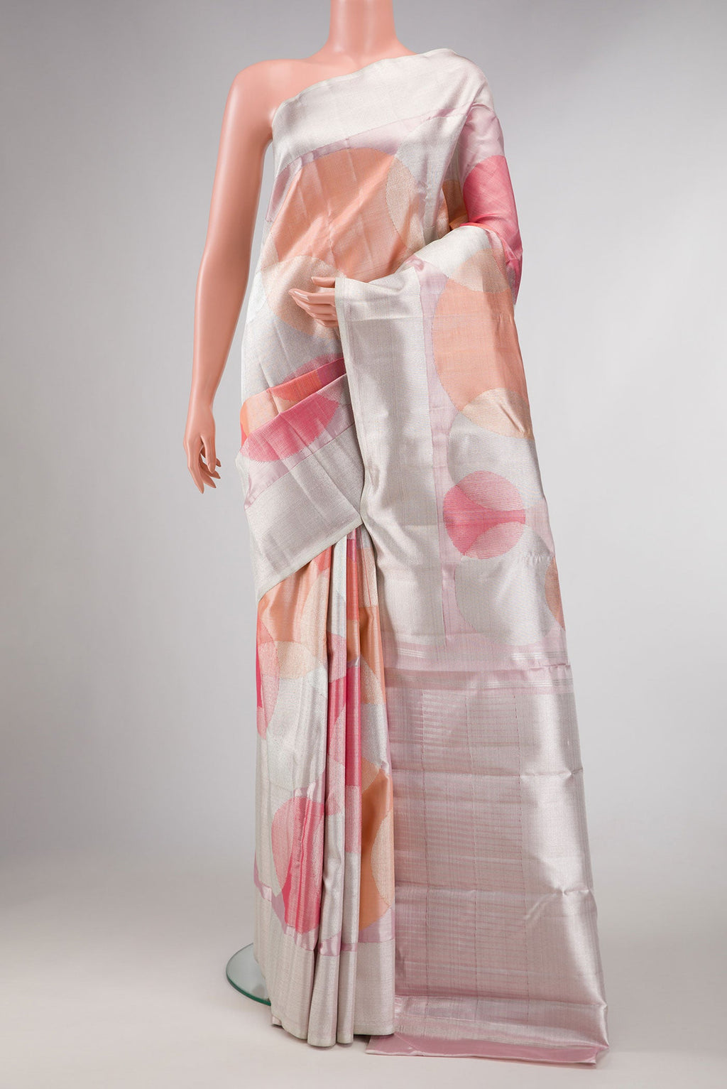 Pink , Maroon and Orange Dual Tone Kanchipuram Silk Saree with Zari Brocade on the body and Zari Border displayed on a mannequin