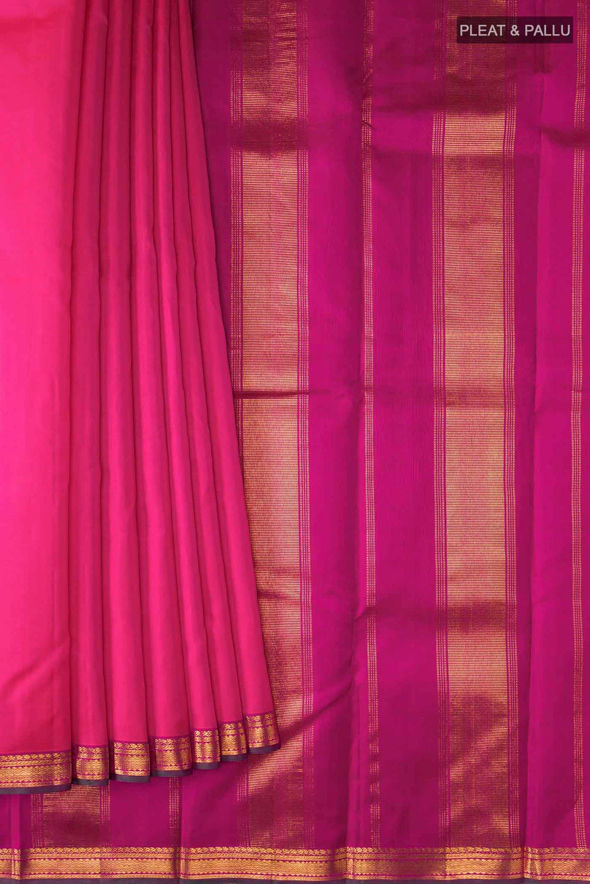 Pleats and pallu of Pink Kanchipuram Silk Saree with Plain Body and Zari Border