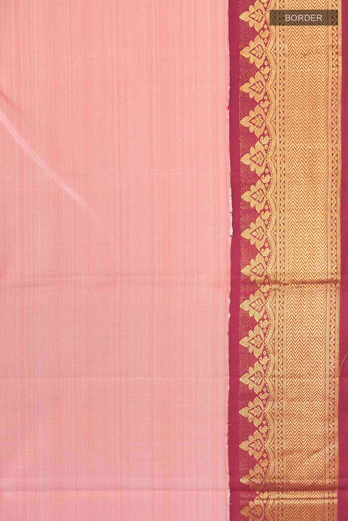 Border image of Peach Kanchipuram Silk Saree with Plain Body and Zari Border