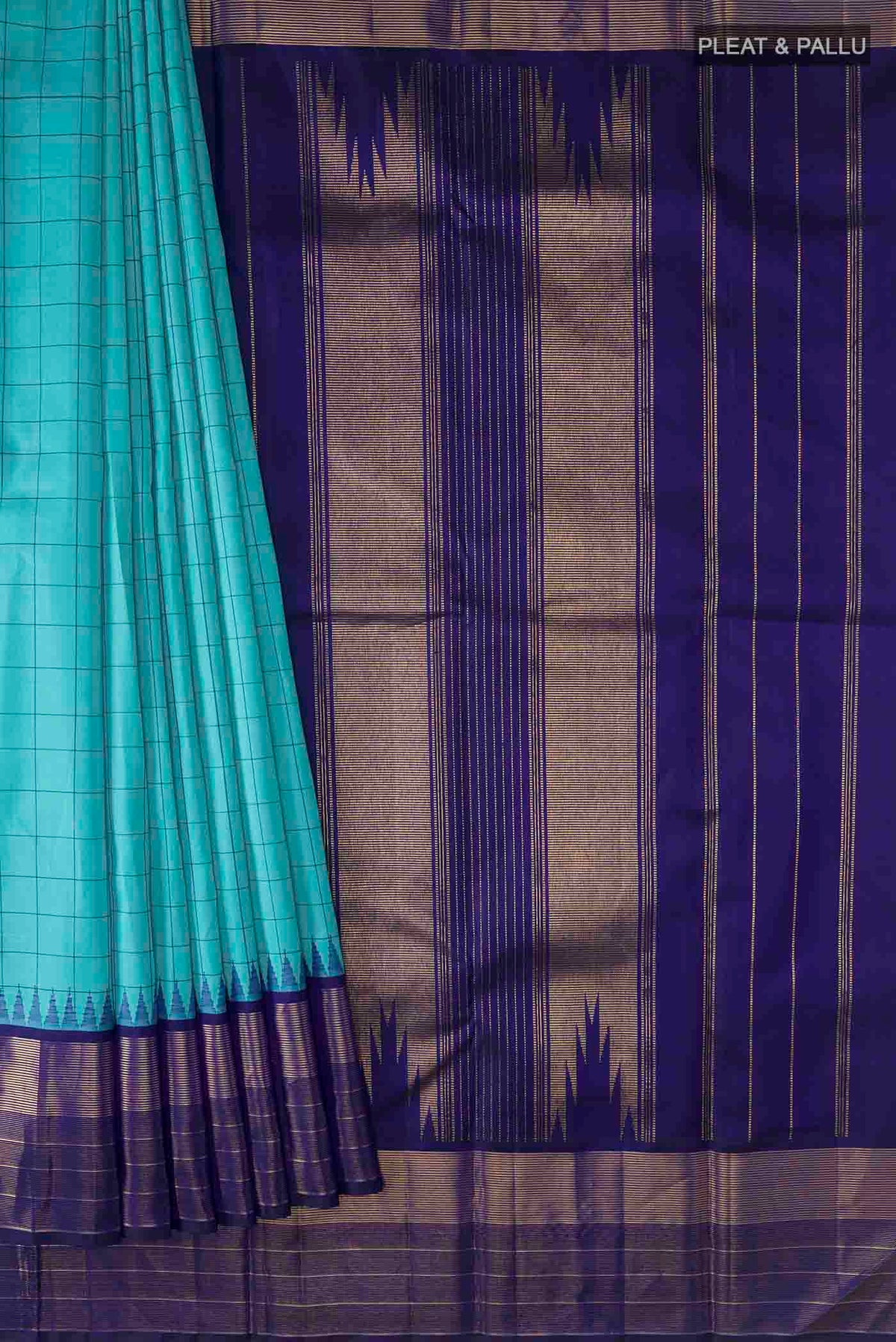 Pleats and pallu of Blue Kanchipuram Silk Saree with Checked design on the body and Zari Border