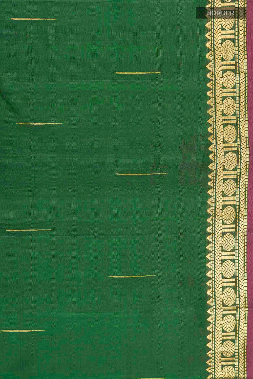Border image of Green Kanchipuram Silk Saree with Zari Butta on the body and Zari Border