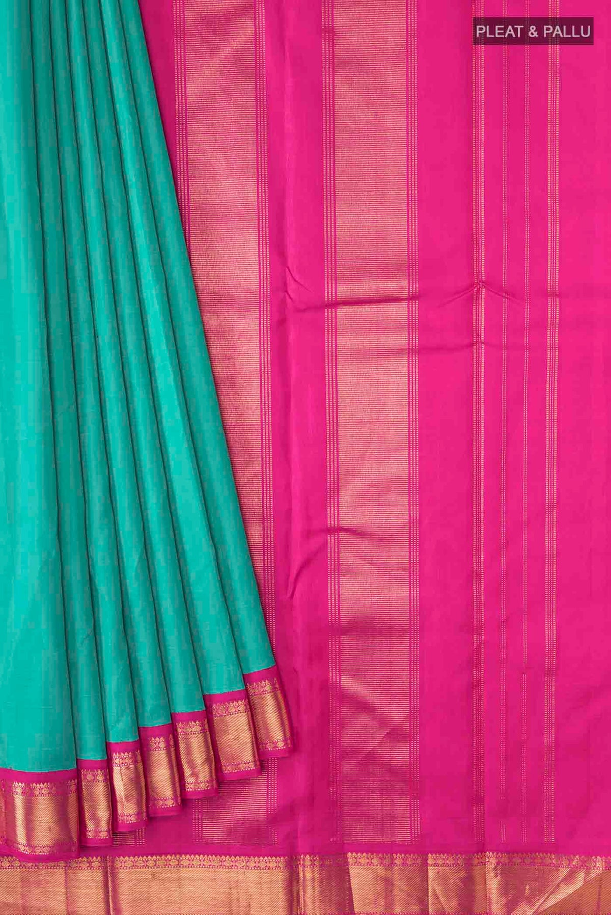Pleats and pallu of Green Kanchipuram Silk Saree with Plain Body and Zari Border