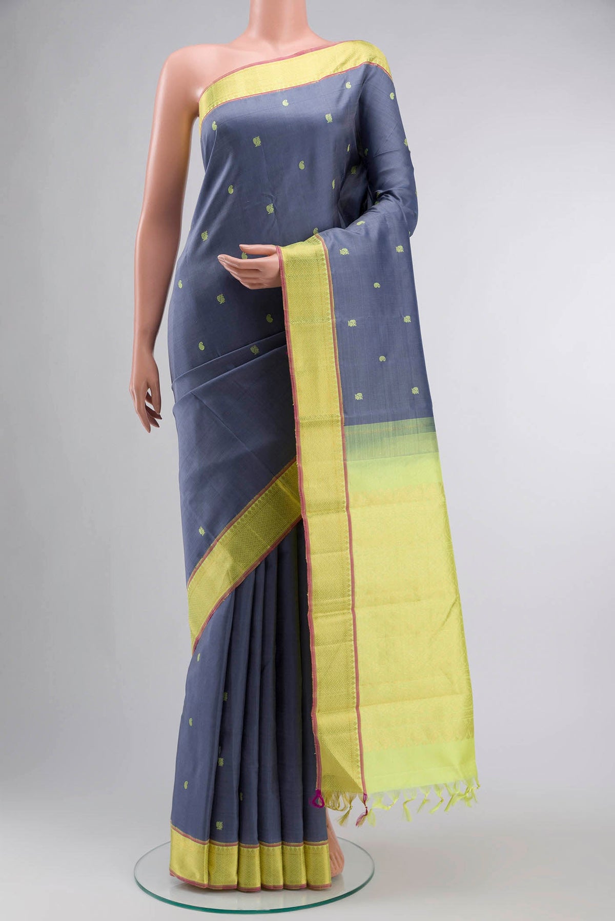 Blue Kanchipuram Silk Saree with Thread Butta on the body and Zari Border displayed on a mannequin