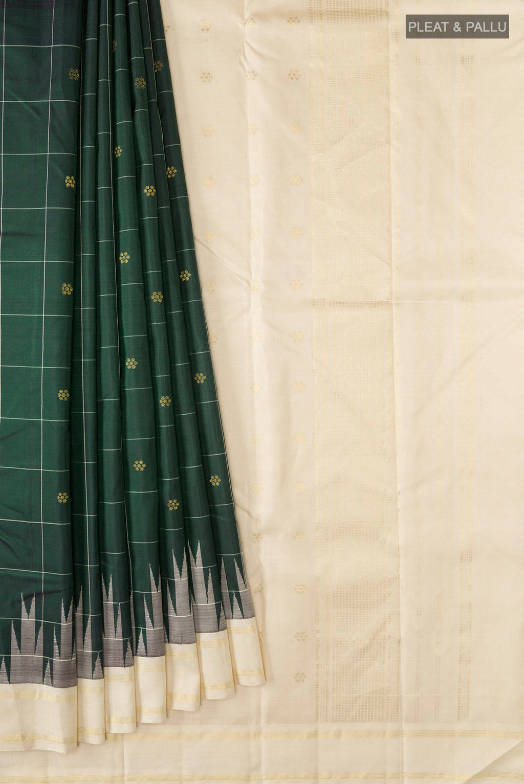 Pleats and pallu of Green Kanchipuram Silk Saree with Zari Butta on the body and Zari Border