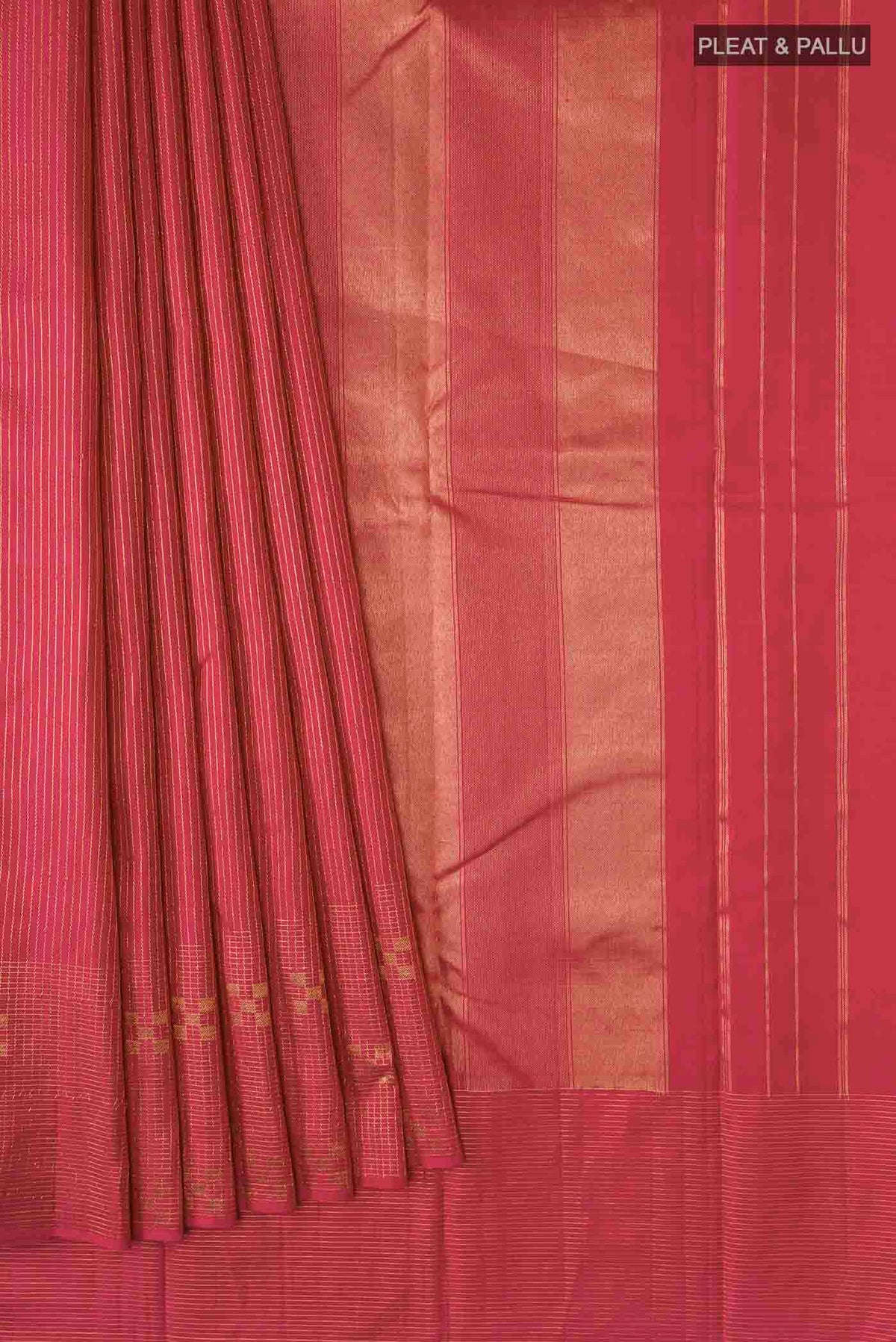 Pleats and pallu of Maroon Kanchipuram Silk Saree with Stripes on the body and Zari Border
