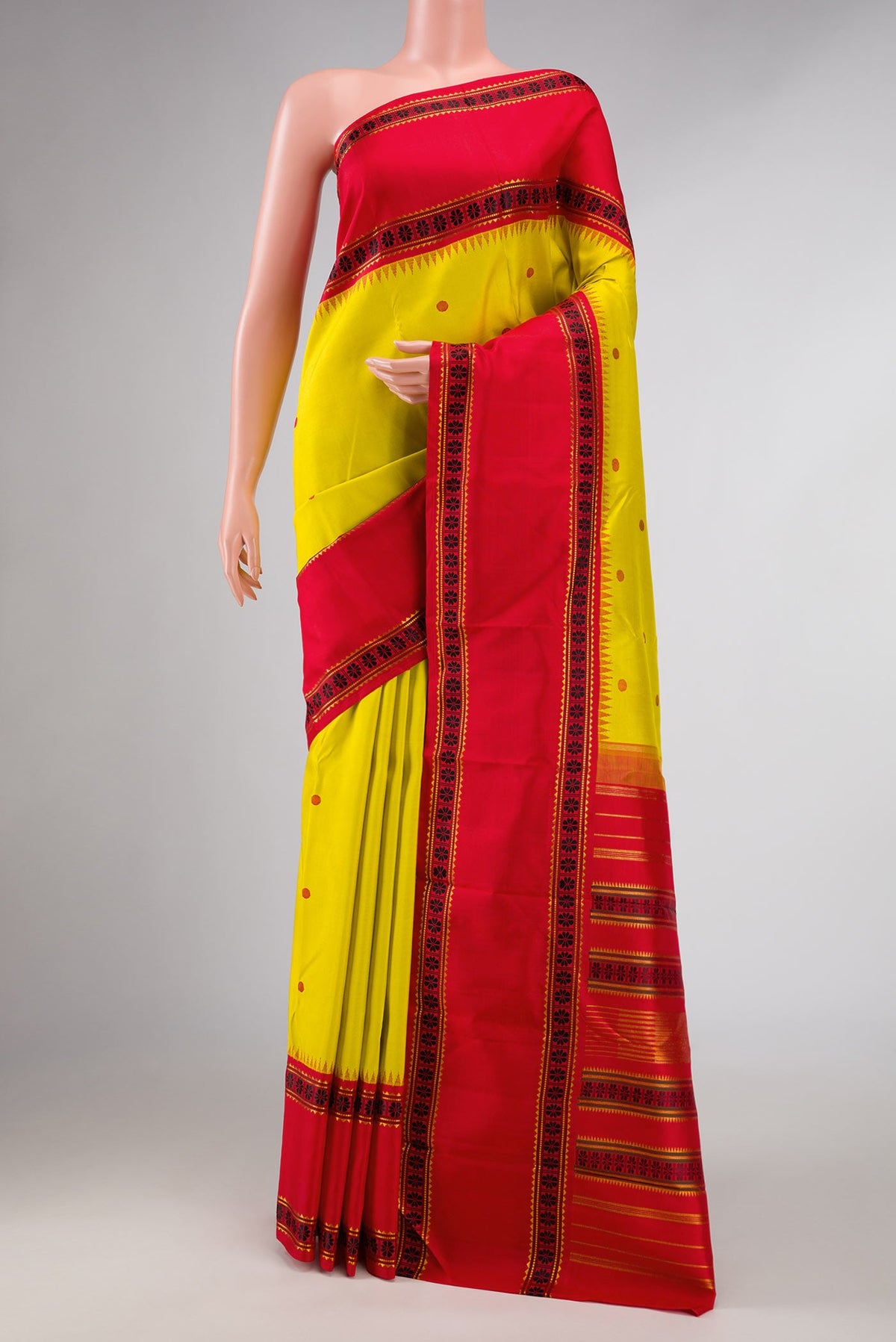 Lemon Yellow Dual Tone Kanchipuram Silk Saree with Thread Butta on the body and Zari Border displayed on a mannequin