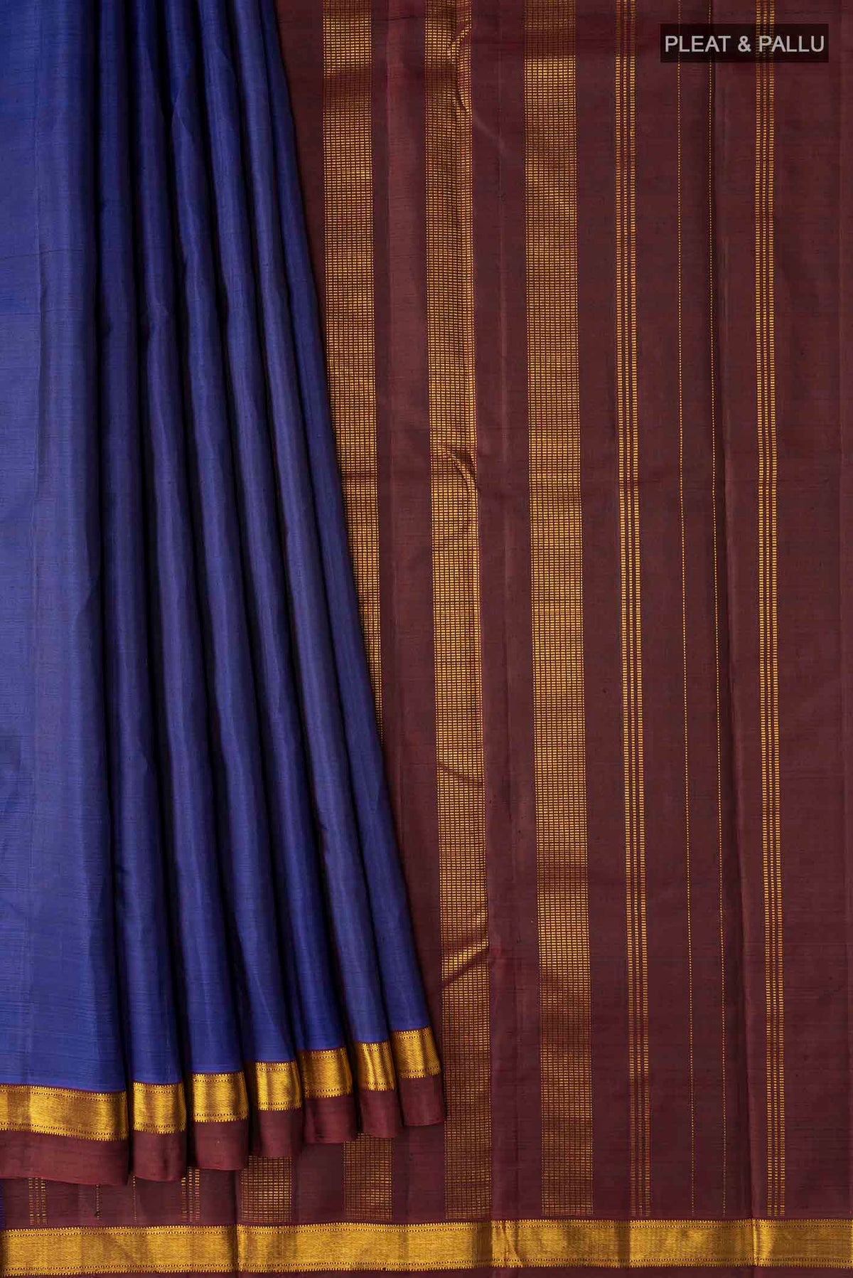 Pleats and pallu of Blue Kanchipuram Silk Saree with Plain Body and Zari Border