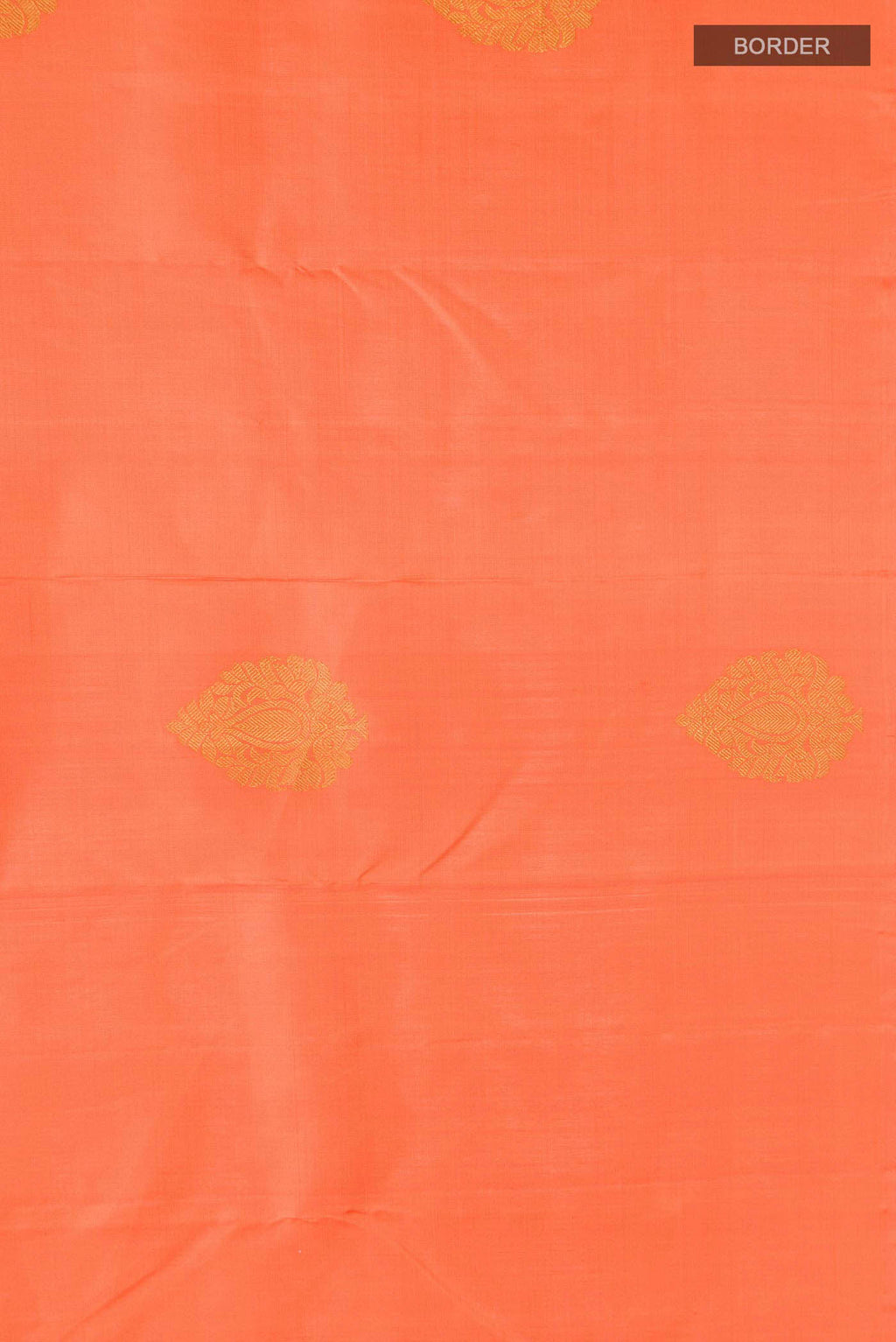 Border image of Orange Kanchipuram Silk Saree with Zari Butta on the body and Without Border