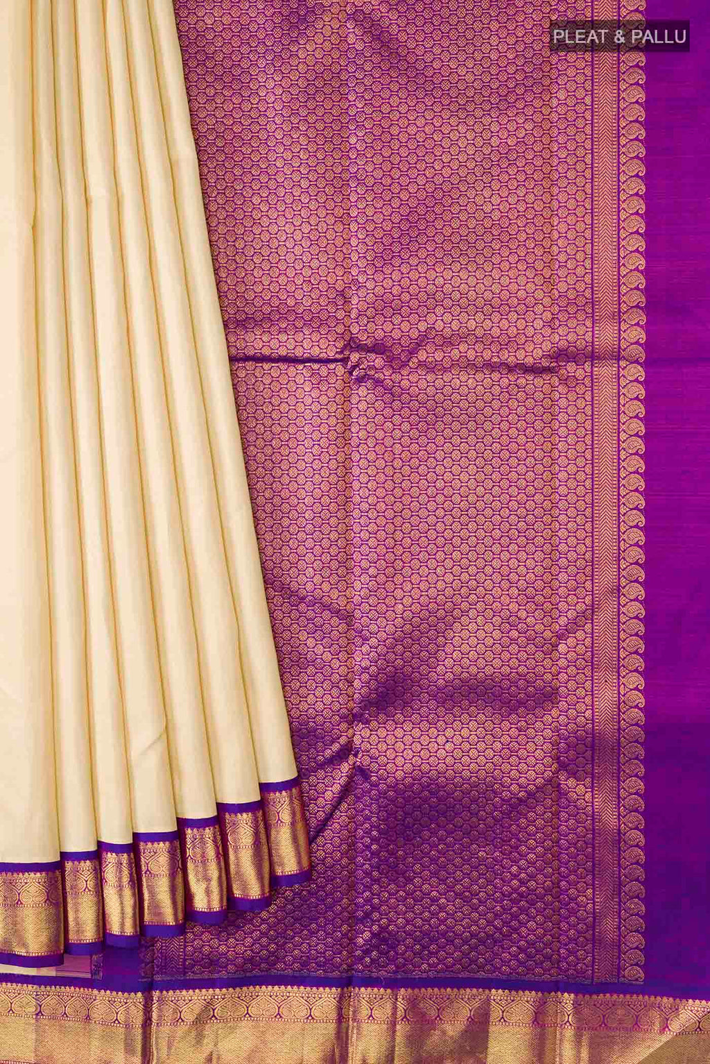 Pleats and pallu of Cream Kanchipuram Silk Saree with Plain Body and Zari Border