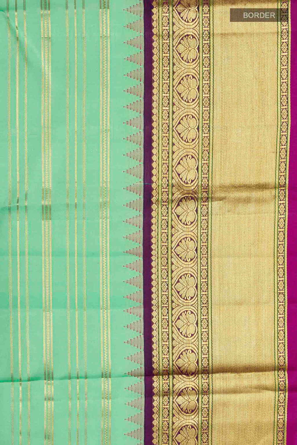 Border image of Green Kanchipuram Silk Saree with Stripes on the body and Zari Border