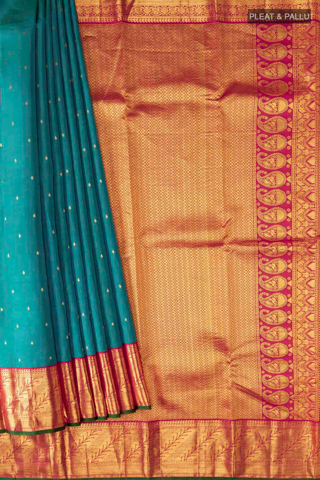 Pleats and pallu of Blue Kanchipuram Silk Saree with Zari Butta on the body and Zari Border